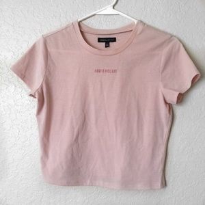 Pink “HAVE A NICE DAY” shirt.